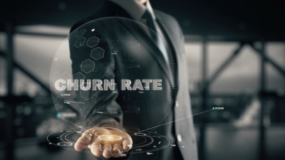 Churn Rate with hologram businessman concept (© ankabala / Fotolia.com)